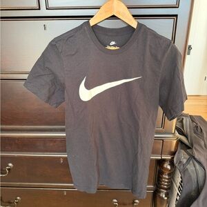 Nike Black Tee with White swoosh. XS